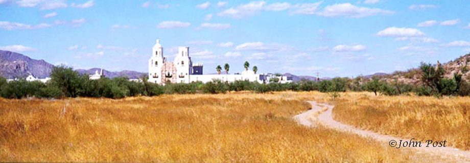 view across field to mission